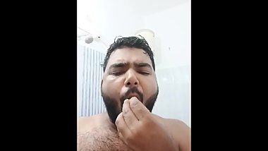 Indian guy fucking his face with cucumber