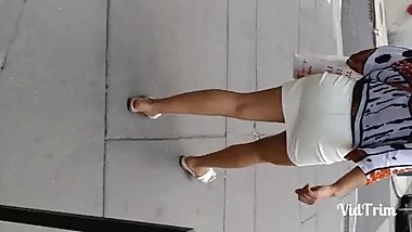 Indian chick in tight tan leather skrit