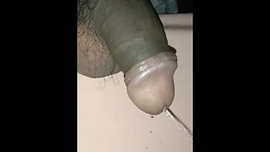 Close up dick pee