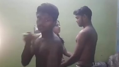 Busty married Desi Bhabhi dancing topless with 3 young boys