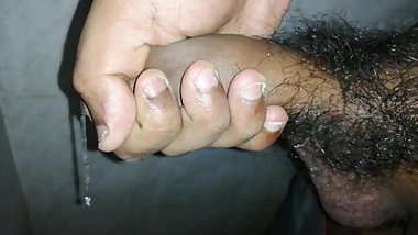 Indian boy mastrubating black cock in bathroom