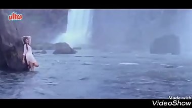 Wet Hot Indian Actress getting wet in sexy clothes in river