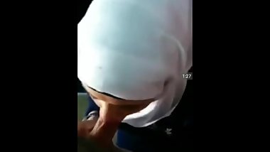 Hijabi babysitter giving blowjob
