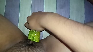 Masterbation with cucumber